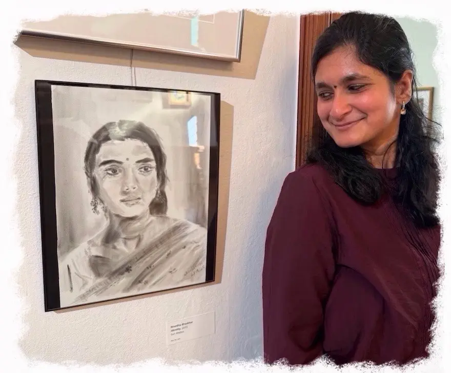 Artist Niv Bhaskhar with pan pastel art work